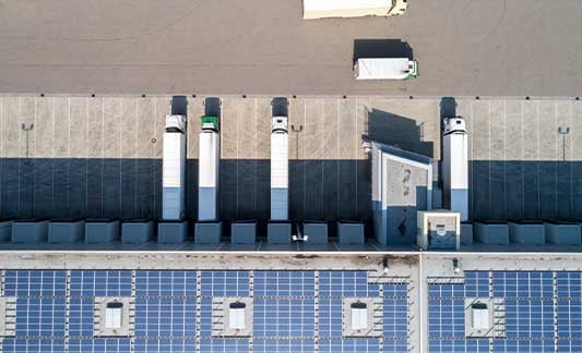 trucks_leaving_warehouse_birds_eye_view