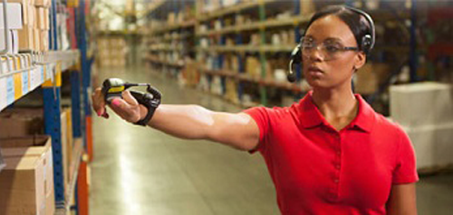 DC worker in Honeywell warehouse scanning barcode