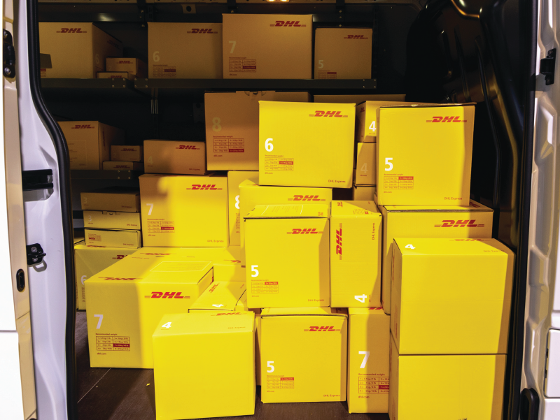 DHL boxes on a delivery truck