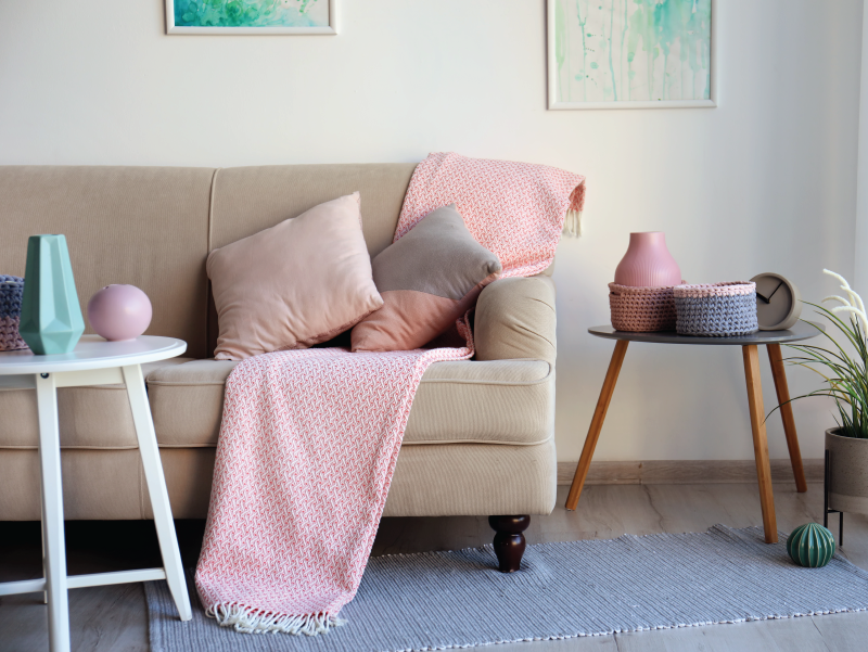 Home interior decor including a couch and side table